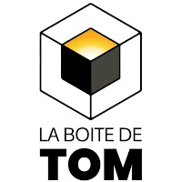 Logo de la boîte de Tom